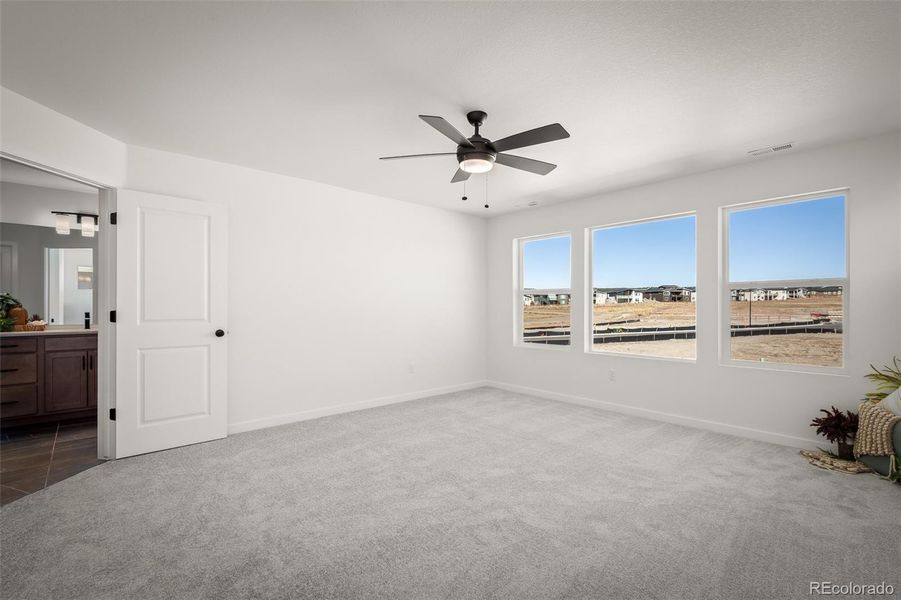 Spacious, unfurnished interior of a new home in Revel Crossing at Wolf Ranch – The Ascent Collection, Colorado Springs (Image 22).