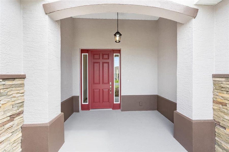 Exterior details and patio area of a home in On Top of the World Communities, Ocala (Image 20).