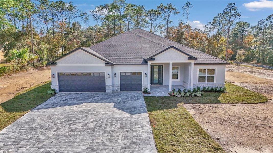Front exterior of a new home in , Beverly Hills, FL, highlighting curb appeal (Image 2). Front exterior of a new home in , Beverly Hills, FL, highlighting curb appeal (Image 2).