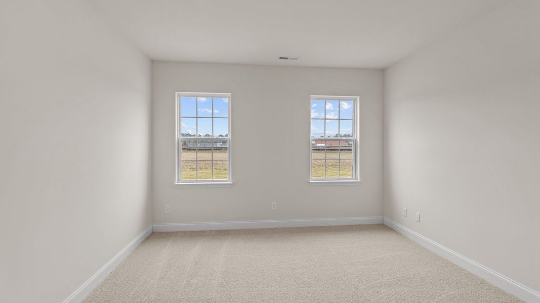 Spacious, unfurnished interior of a new home in Villa Grande, Winterville (Image 17).