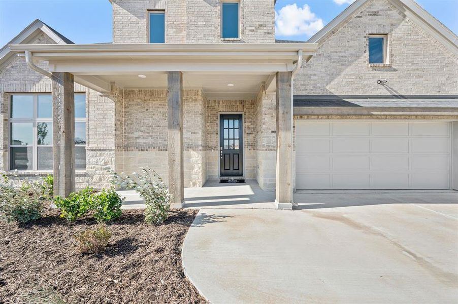 Exterior details and patio area of a home in Settlers Glen, New Fairview (Image 3).
