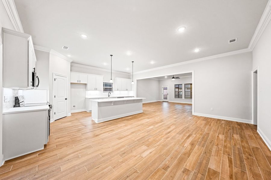 Spacious, unfurnished interior of a new home in Bird Song at Hammock Bay, Freeport (Image 12).