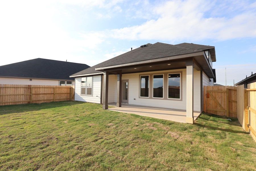Exterior details and patio area of a home in Mason Woods, Cypress (Image 3).