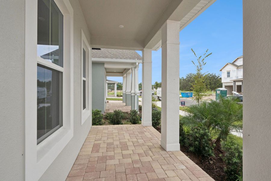 Exterior details and patio area of a home in Northlake at Ovation, Winter Garden (Image 2).