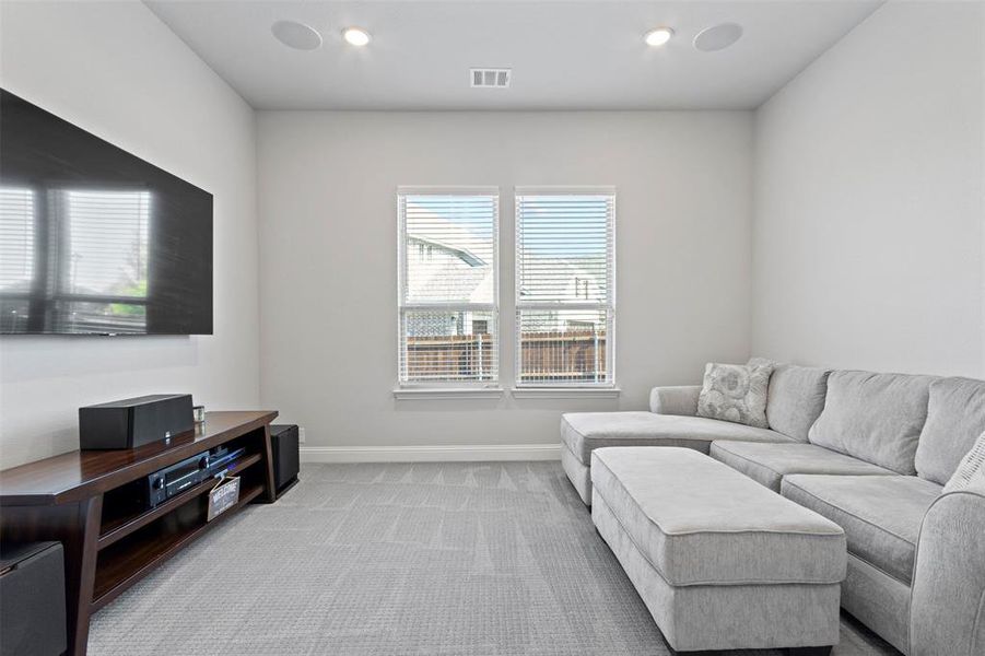 Living room with light carpet