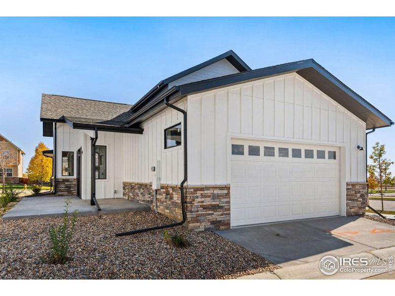 Front exterior of a new home in , Fort Collins, CO, highlighting curb appeal (Image 22). Front exterior of a new home in , Fort Collins, CO, highlighting curb appeal (Image 22).