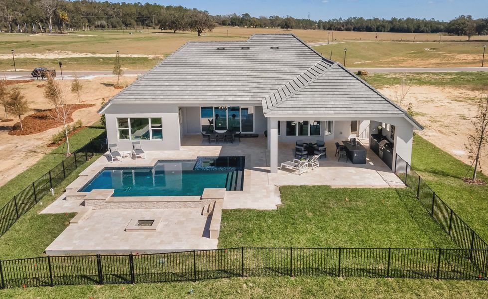 Exterior details and patio area of a home in West Hill Estates, Dade City (Image 3).