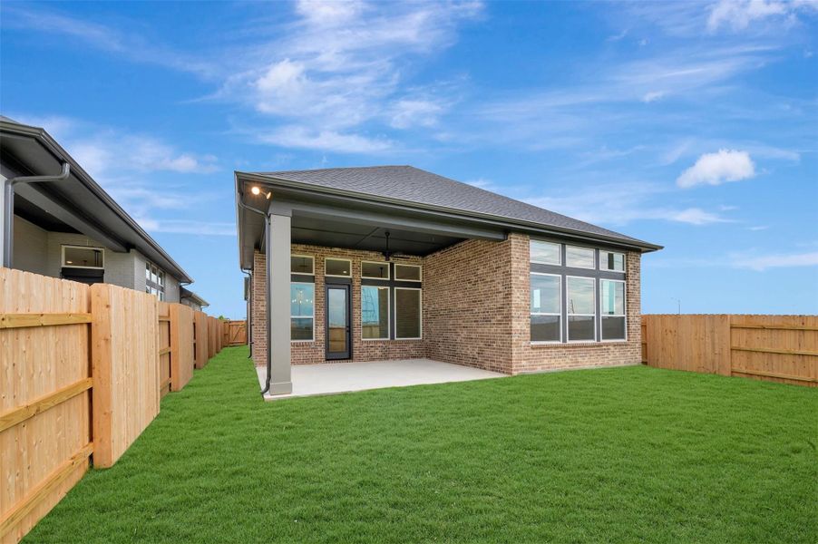 Exterior details and patio area of a home in Elyson - Reserve Collection, Katy (Image 3).