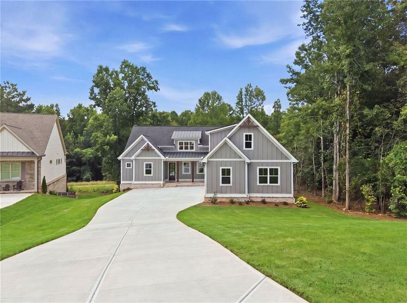 Front exterior of a new home in , Jefferson, GA, highlighting curb appeal (Image 29).