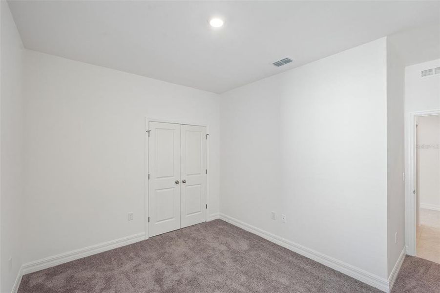 Spacious, unfurnished interior of a new home in Heritage Station, Punta Gorda (Image 22). Spacious, unfurnished interior of a new home in Heritage Station, Punta Gorda (Image 22).