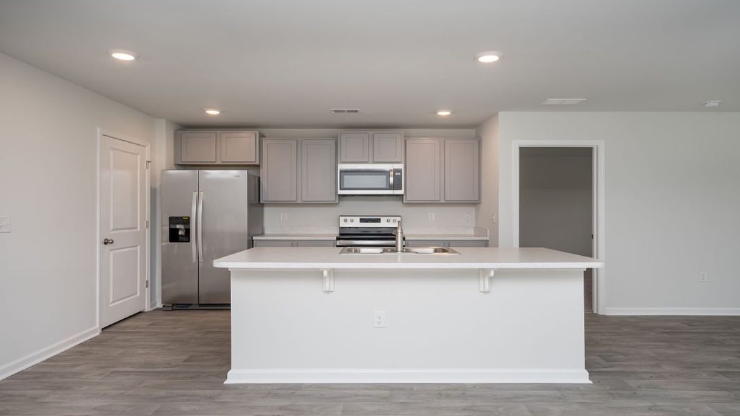 Representative furnished interior of a home built from the ARIA by D.R. Horton in The Meadows at Wildwood Village, Shallotte (Image 6). Representative furnished interior of a home built from the ARIA by D.R. Horton in The Meadows at Wildwood Village, Shallotte (Image 6).