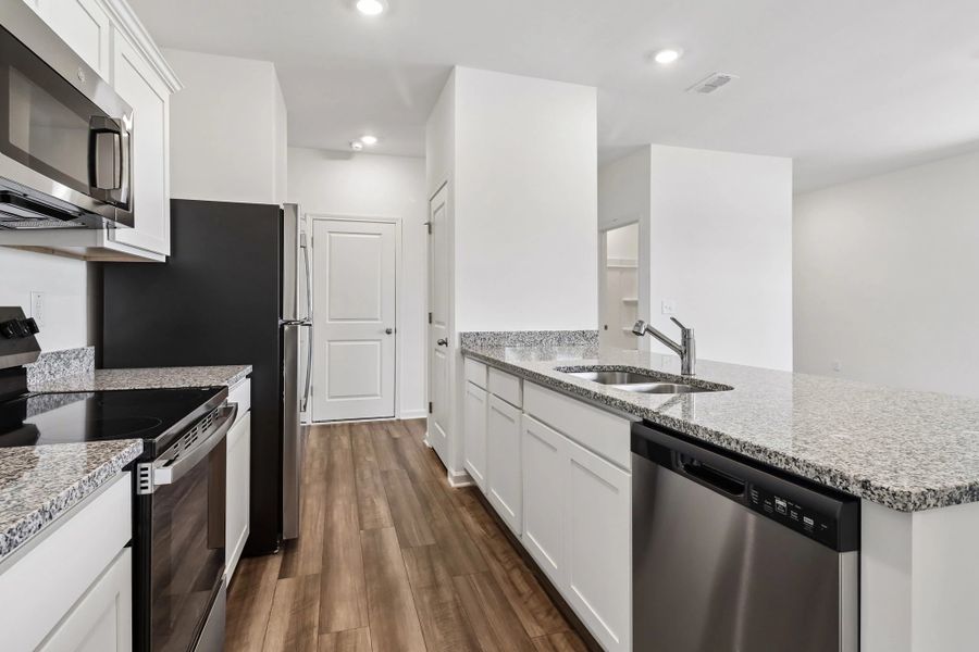 Representative furnished interior of a home built from the Larissa by Starlight Homes in Crescent Pointe, Carrollton (Image 10).