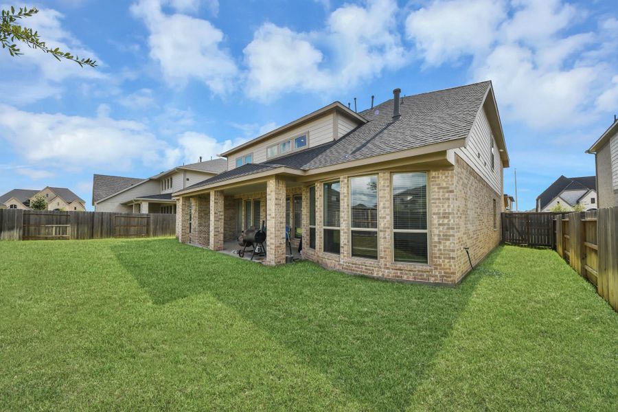 Oversized yard with room to relax and play.