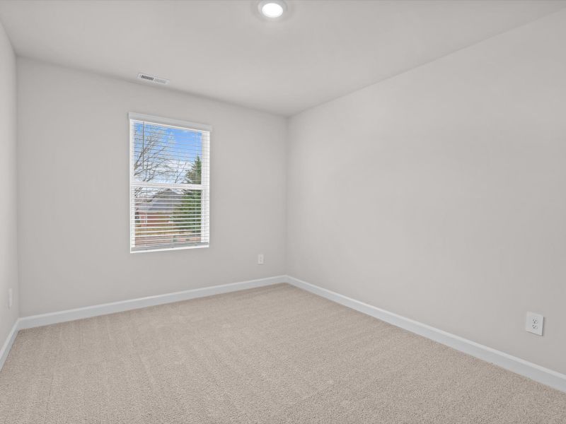 Spacious, unfurnished interior of a new home in Crossing at Abner Creek Townes, Greer (Image 17).