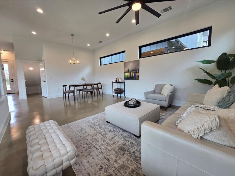 Set up the living space as you wish - lots of space for dining, living, or play areas. Lots of windows throughout, uppers for light and privacy from neighbors, and huge windows to your back yard.