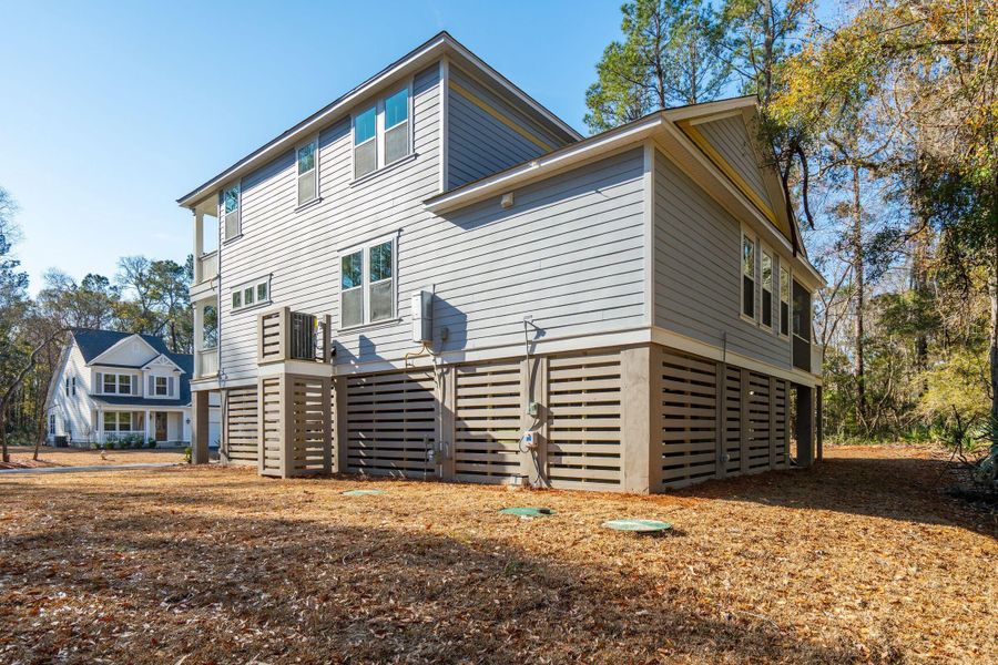 Exterior details and patio area of a home in Waterloo Estates, Johns Island (Image 38).
