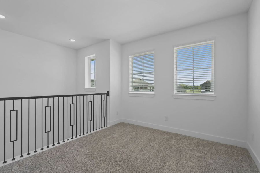 Representative unfurnished interior of a home built from the St Andrews by Chesmar Homes in Riceland Alley Loads, Mont Belvieu (Image 45).