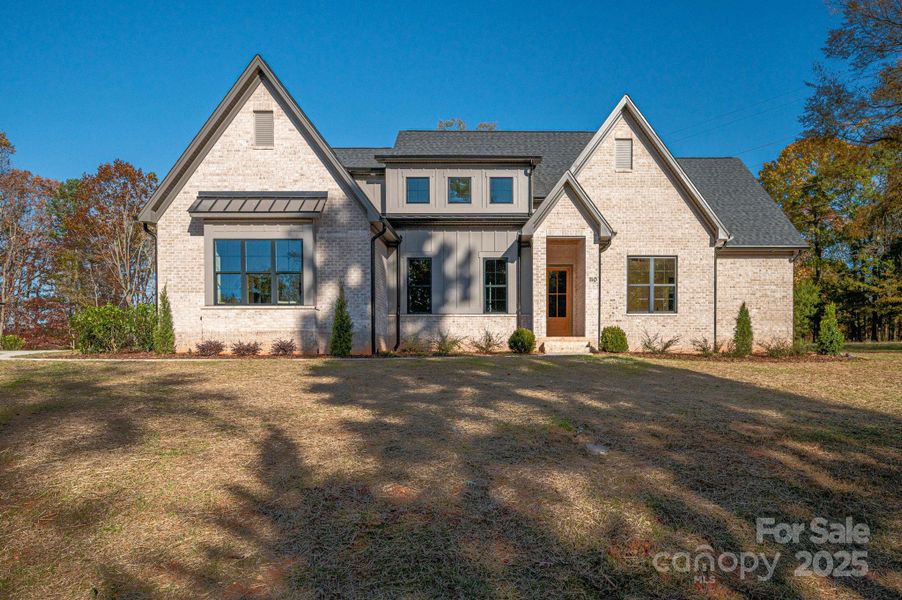 Front exterior of a new home in , Belmont, NC, highlighting curb appeal (Image 2).