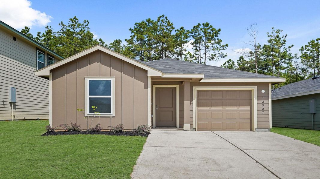 Front exterior of a new home in McCrorey Trails, Conroe, TX, highlighting curb appeal (Image 13).