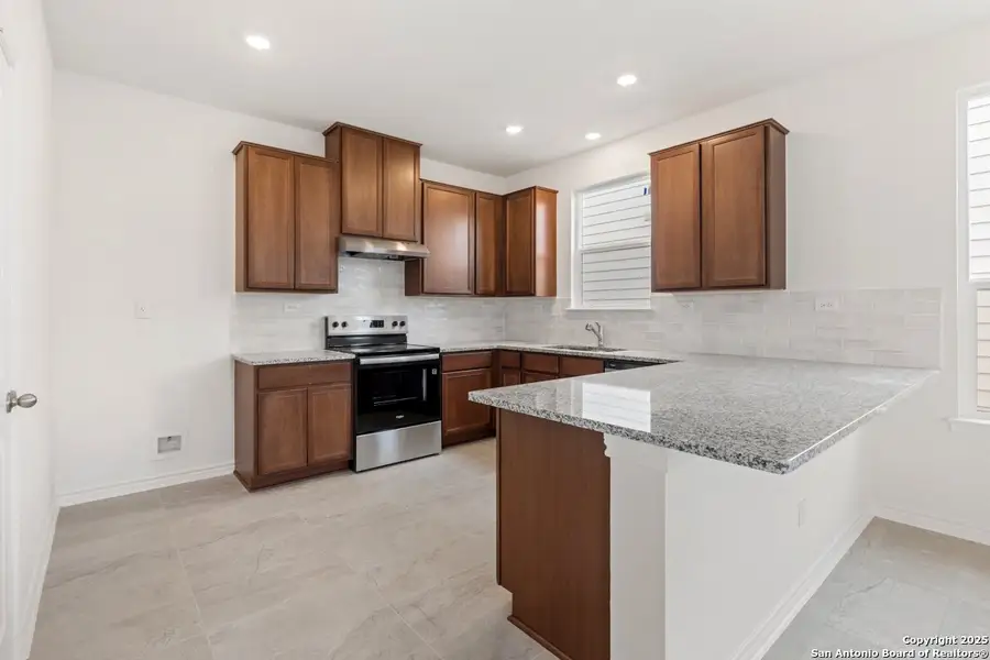 Furnished interior view inside a new home in Southton Cove, Elmendorf (Image 6).
