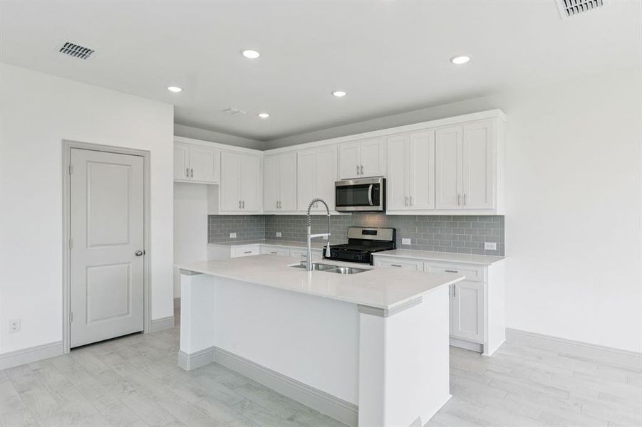 Furnished interior view inside a new home in AnaCapri, Anna (Image 6).