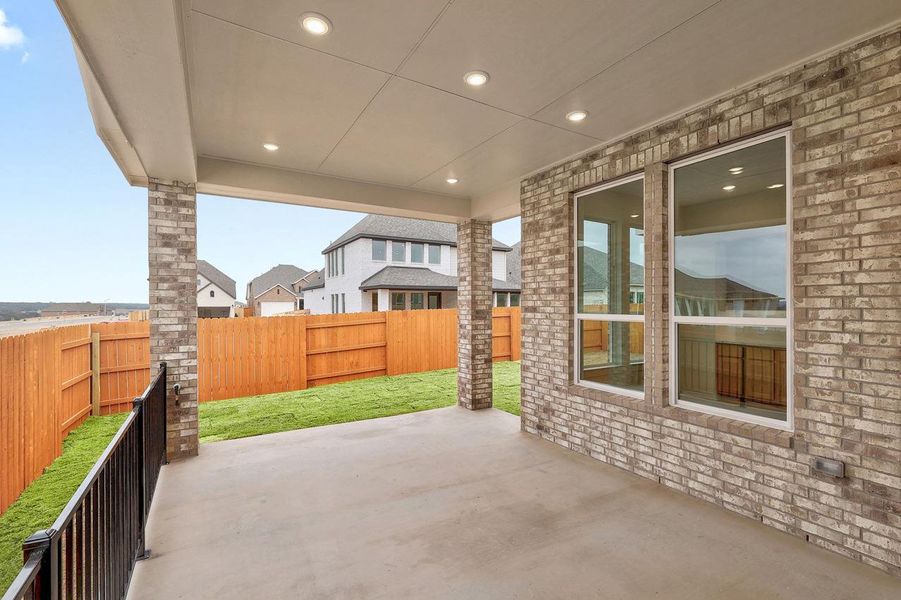Exterior details and patio area of a home in Lariat, Liberty Hill (Image 20).