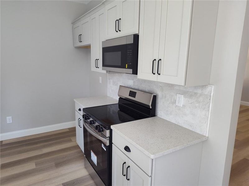 Furnished interior view inside a new home in , Cumming (Image 3). Furnished interior view inside a new home in , Cumming (Image 3).