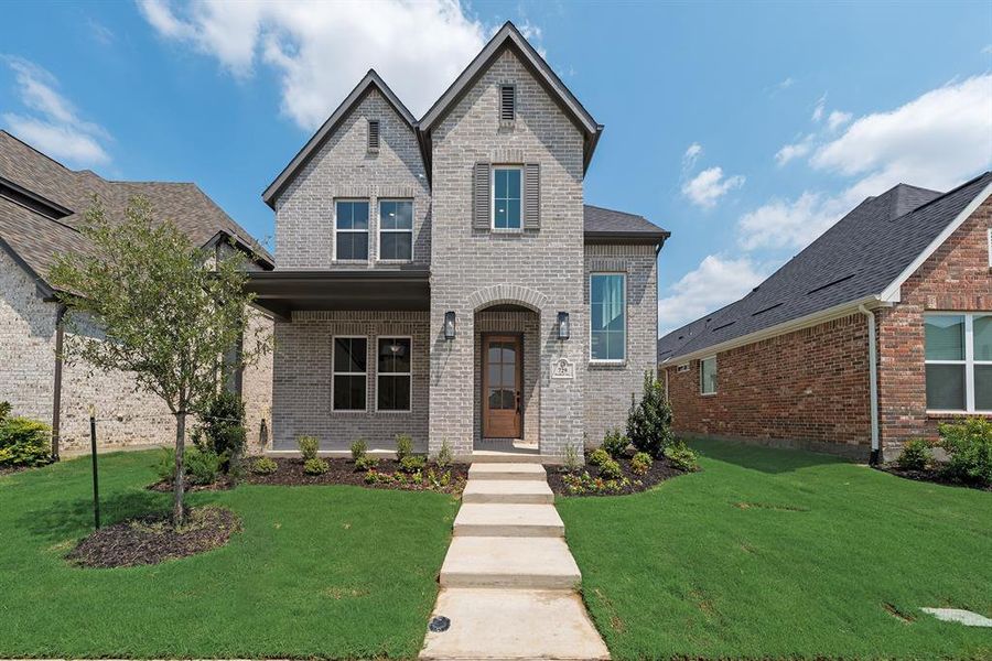 Front exterior of a new home in Light Farms Brenham - 40' Lots, Celina, TX, highlighting curb appeal (Image 23).