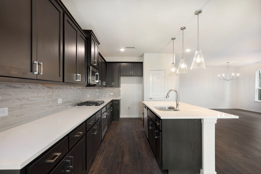 Representative furnished interior of a home built from the Hawthorne by UnionMain Homes in Edgewater, Fate (Image 12).