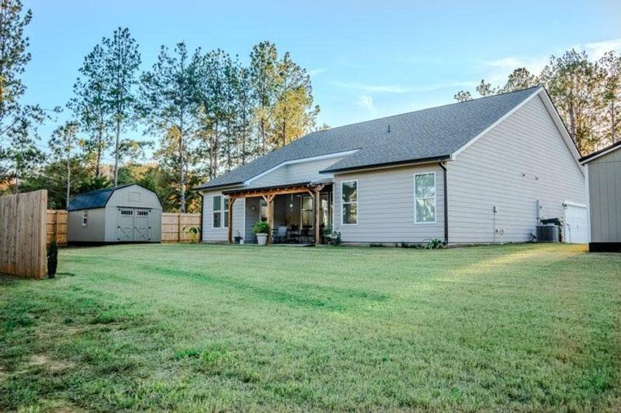 Exterior details and patio area of a home in Crossing Creeks, Monroe (Image 3).