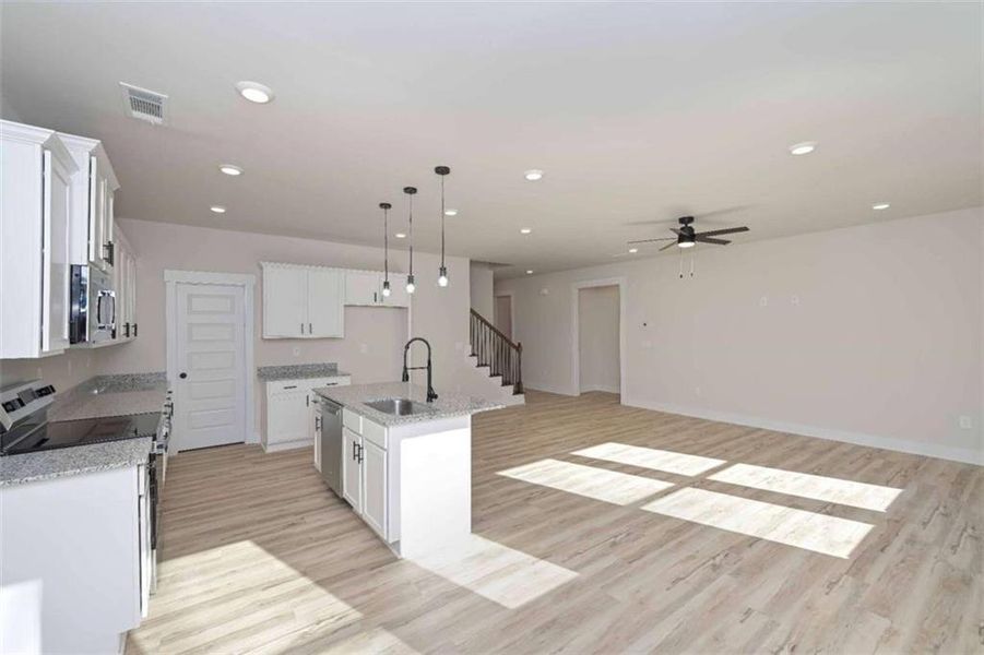 Furnished interior view inside a new home in , Buchanan (Image 8).