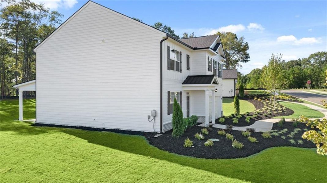 Front exterior of a new home in Jackson Landing, Jefferson, GA, highlighting curb appeal (Image 27). Front exterior of a new home in Jackson Landing, Jefferson, GA, highlighting curb appeal (Image 27).