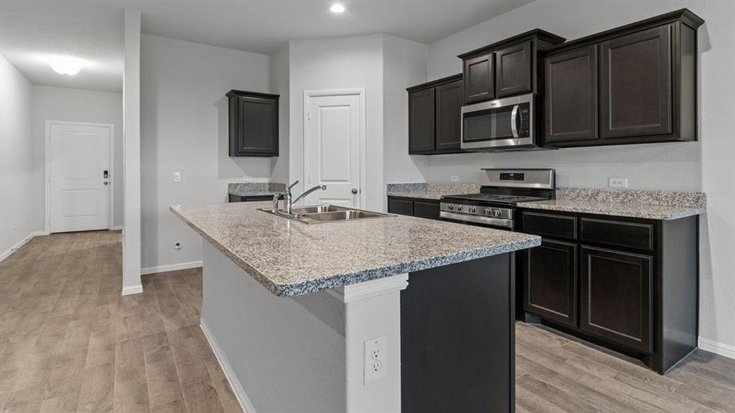 Kitchen - All Home and community information, including pricing, included features, terms, availability and amenities, are subject to change at any time without notice or obligation. All Drawings, pictures, photographs, video, square footages, floor plans, elevations, features, colors and sizes are approximate for illustration purposes only and will vary from the homes as built.