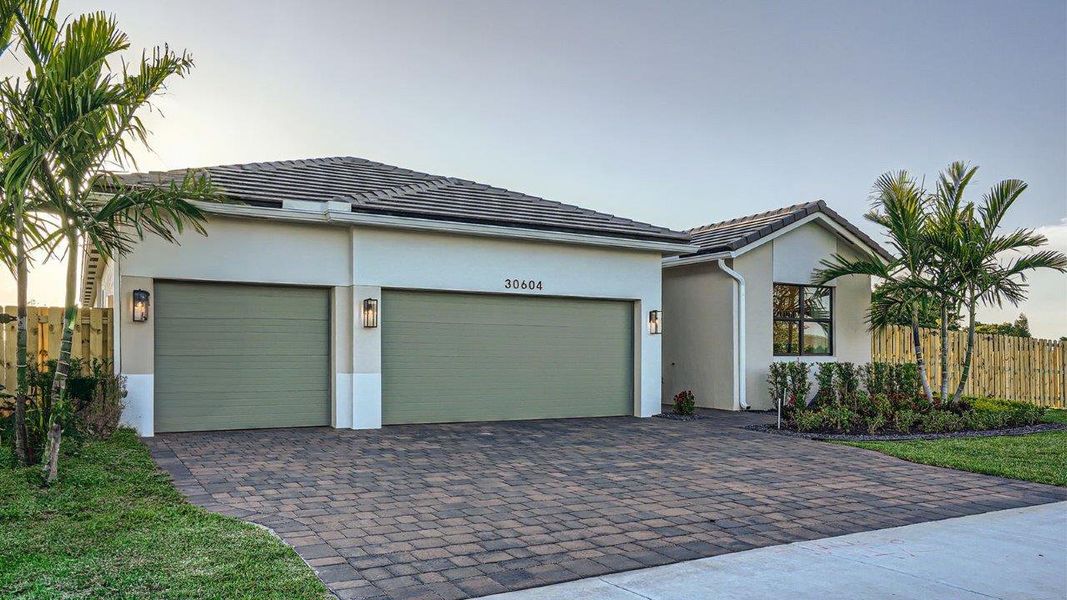Representative exterior photo of a completed home built from the Destin by D.R. Horton in Estrella Square, Homestead, FL (Image 2). Representative exterior photo of a completed home built from the Destin by D.R. Horton in Estrella Square, Homestead, FL (Image 2).