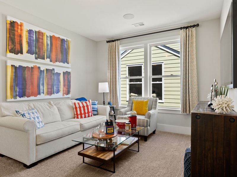 Representative furnished interior of a home built from the Riley P by True Homes in Homecoming, Ravenel (Image 14).