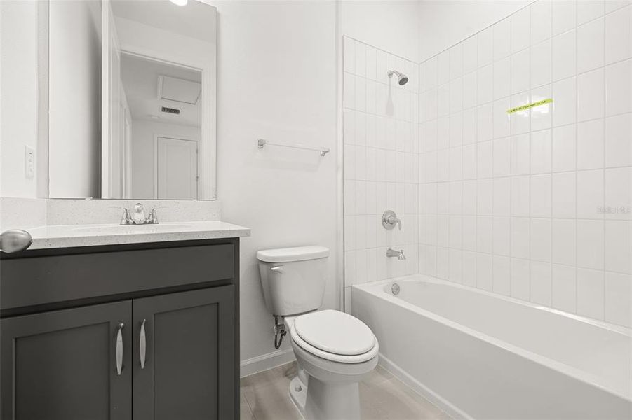 Furnished interior view inside a new home in Serenade at Ovation, Winter Garden (Image 5).