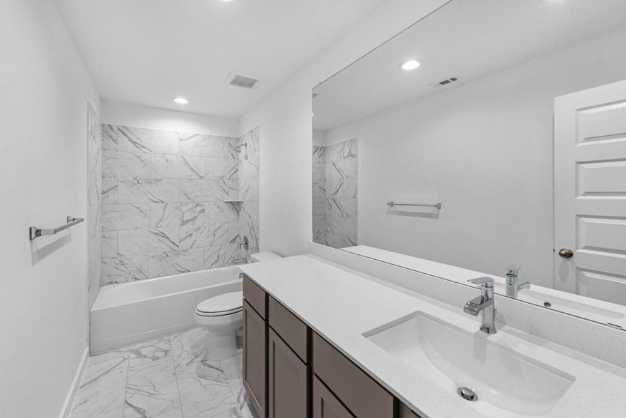 Furnished interior view inside a new home in Grand Mason Crossing, Katy (Image 10).