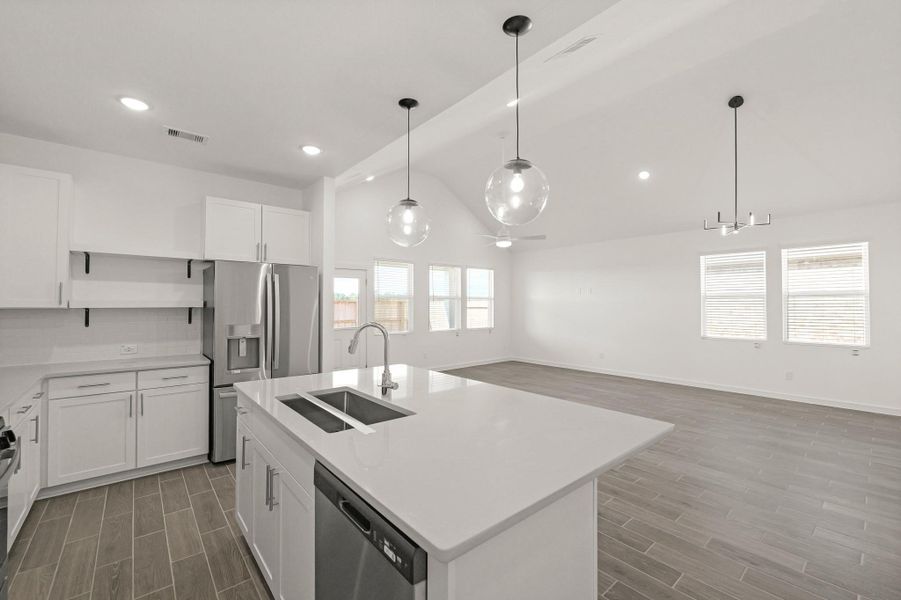 Kitchen open to the great room and dining area