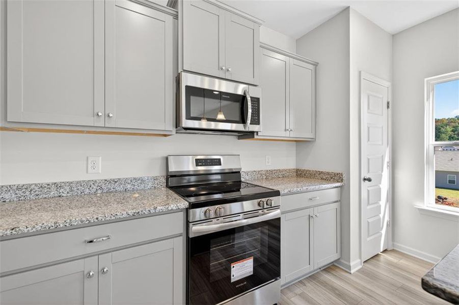Furnished interior view inside a new home in Longbrooke, Rome (Image 9).