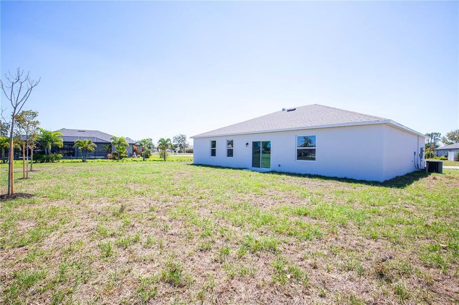 Exterior details and patio area of a home in Burnt Store Village, Punta Gorda (Image 3).
