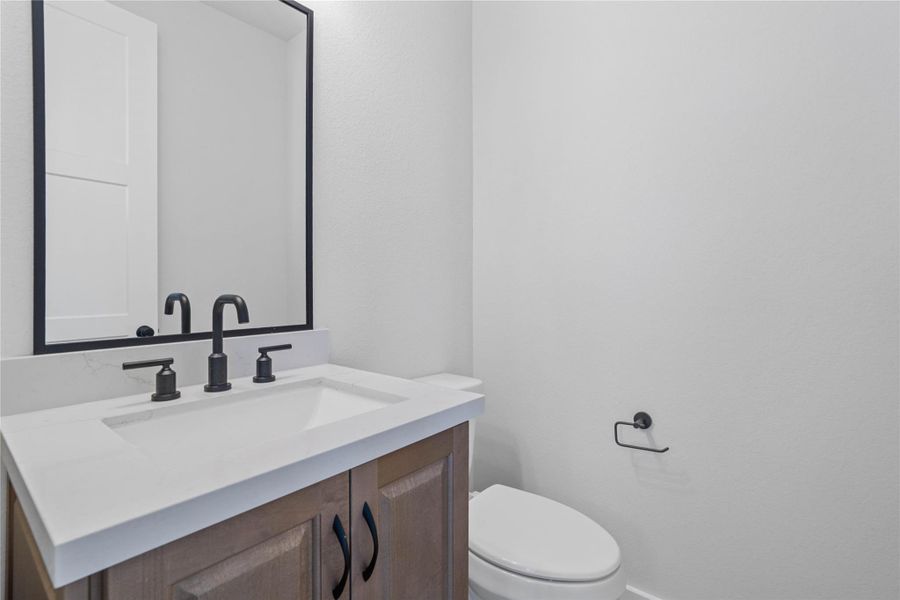 Furnished interior view inside a new home in ARTAVIA, Conroe (Image 11).