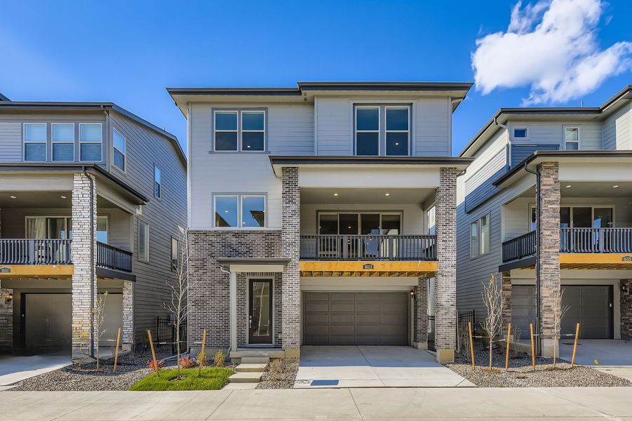 Front exterior of a new home in Red Rocks Ranch: The Skyline Collection, Morrison, CO, highlighting curb appeal (Image 1).