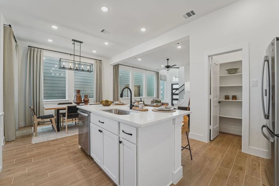Representative furnished interior of a home built from the Versailles by Chesmar Homes in Bridgeland Chateau, Cypress (Image 4).