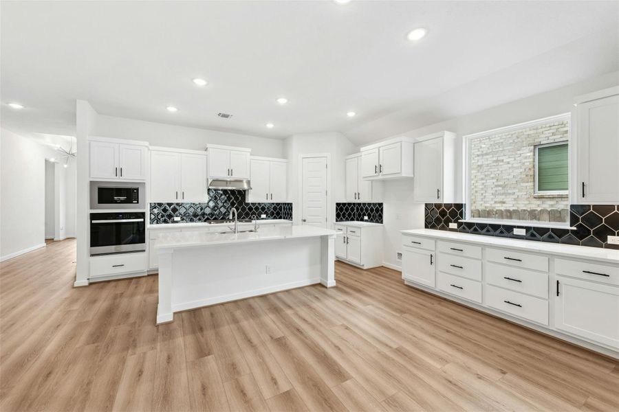 Furnished interior view inside a new home in University Heights, Round Rock (Image 6).