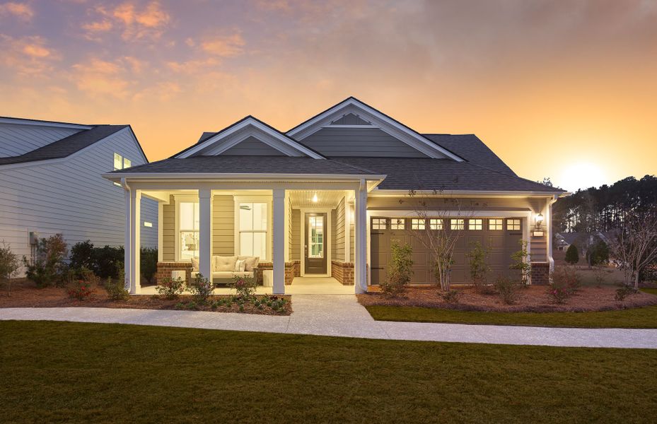 Palmary Exterior with stone accent and a two car garage.