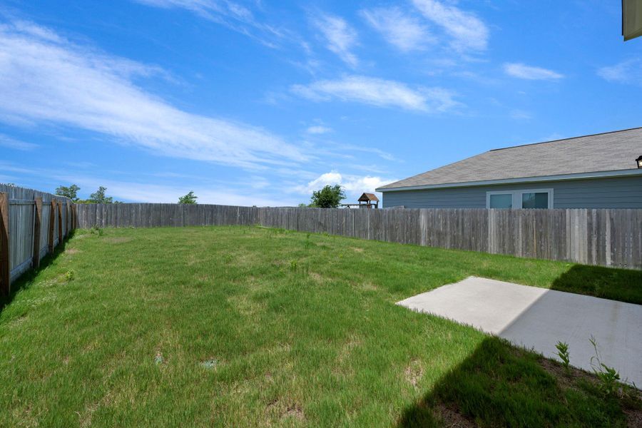 Front exterior of a new home in Cottonwood Farms, Hutto, TX, highlighting curb appeal (Image 21). Front exterior of a new home in Cottonwood Farms, Hutto, TX, highlighting curb appeal (Image 21).