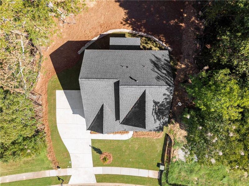 Front exterior of a new home in , Covington, GA, highlighting curb appeal (Image 21). Front exterior of a new home in , Covington, GA, highlighting curb appeal (Image 21).