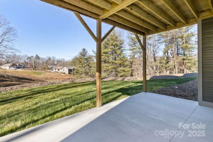 Exterior details and patio area of a home in , Fletcher (Image 17).