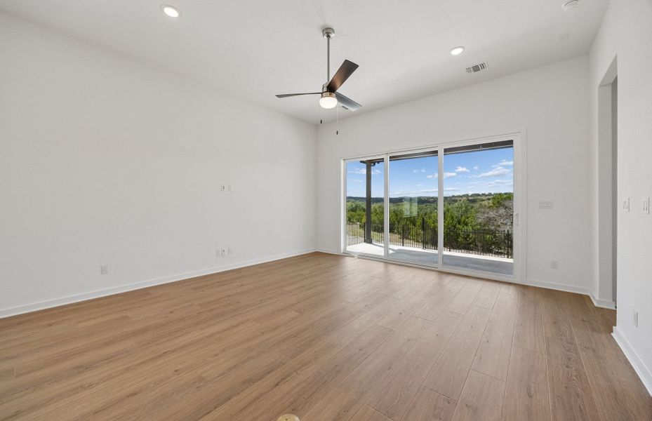 Representative unfurnished interior of a home built from the Wheeler by Pulte Homes in West Cypress Hills, Spicewood (Image 29).