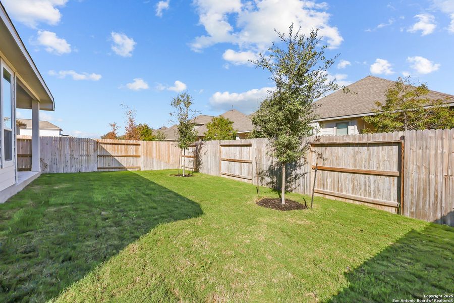 Exterior details and patio area of a home in Stillwater Ranch 45', San Antonio (Image 23).